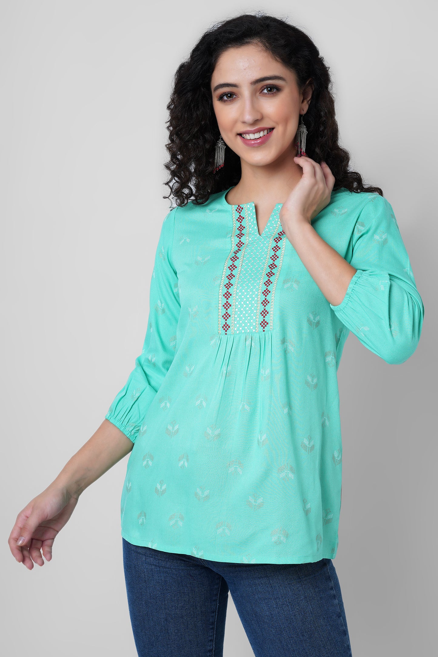 Turquoise Top With Border Embroidery